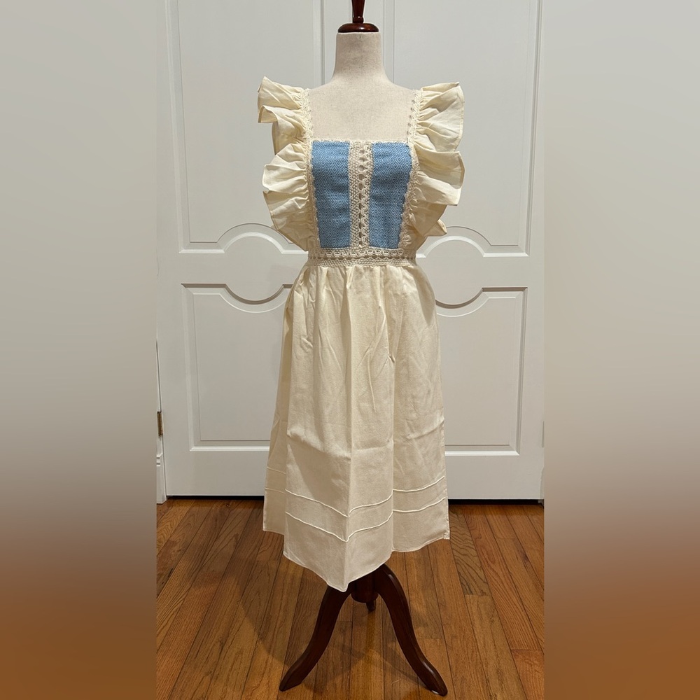 Handloom Mexican embroidered dress with ruffle sleeve.